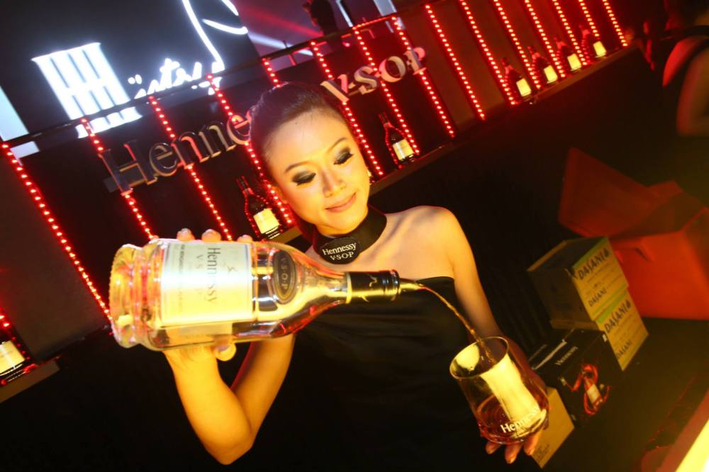 Pretty lady behind the bar