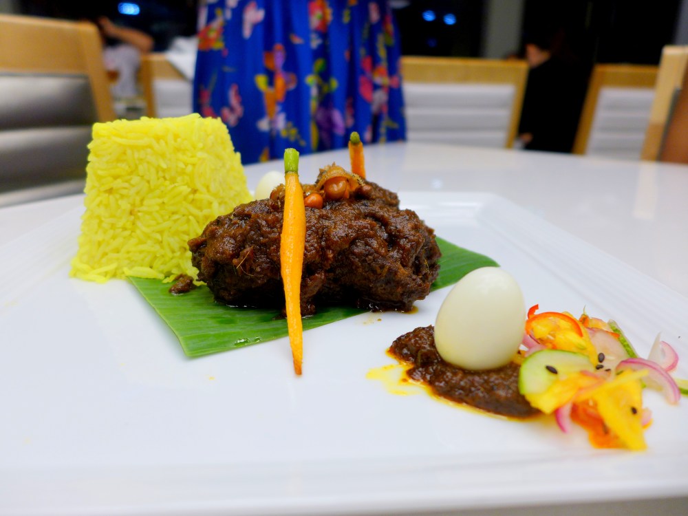 Closer look with Kelly Chin's pretty dress in the background.