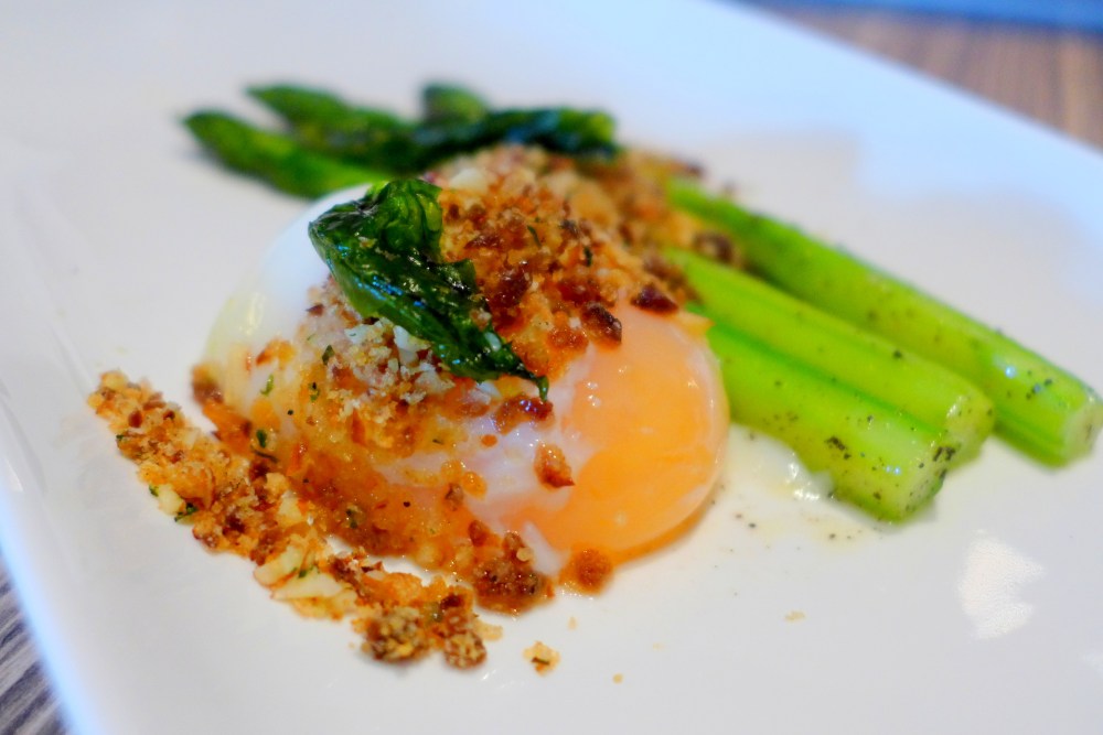Butter Poached Asparagus, Sous-vide Egg, Sultana and Shaved Almond Panna Grattato, Truffle Honey.