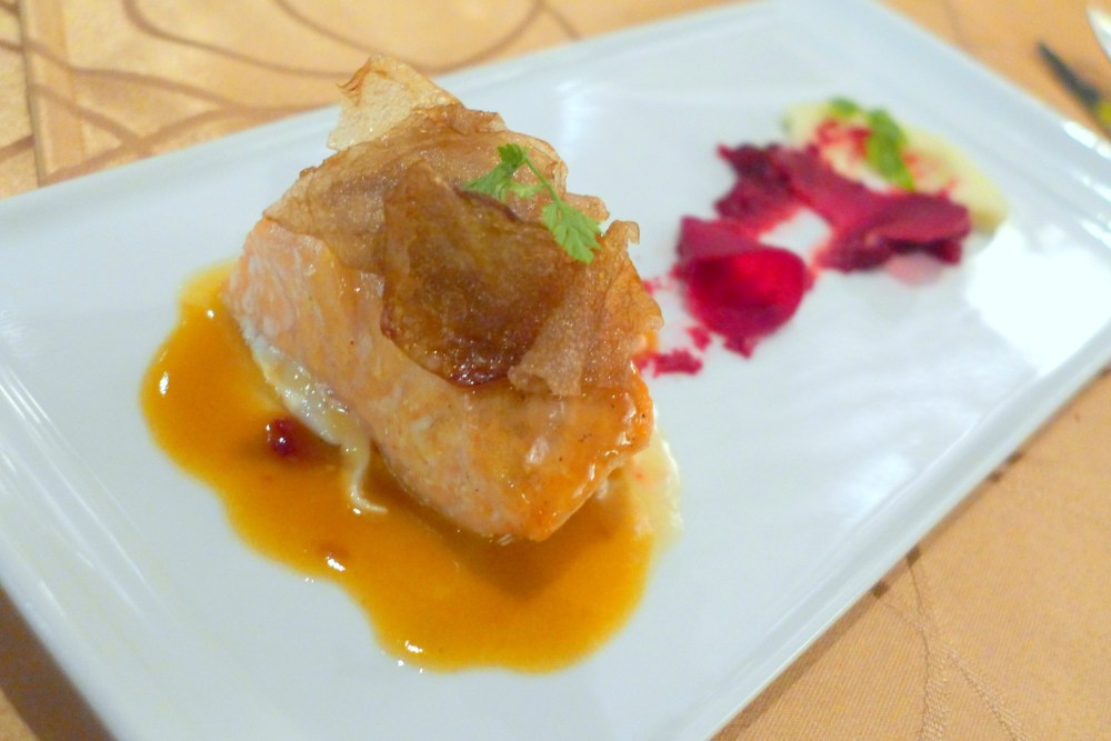 Salmon mi-cuit with pickled beets, cauliflower mousseline, potato chips and spiced butter sauce